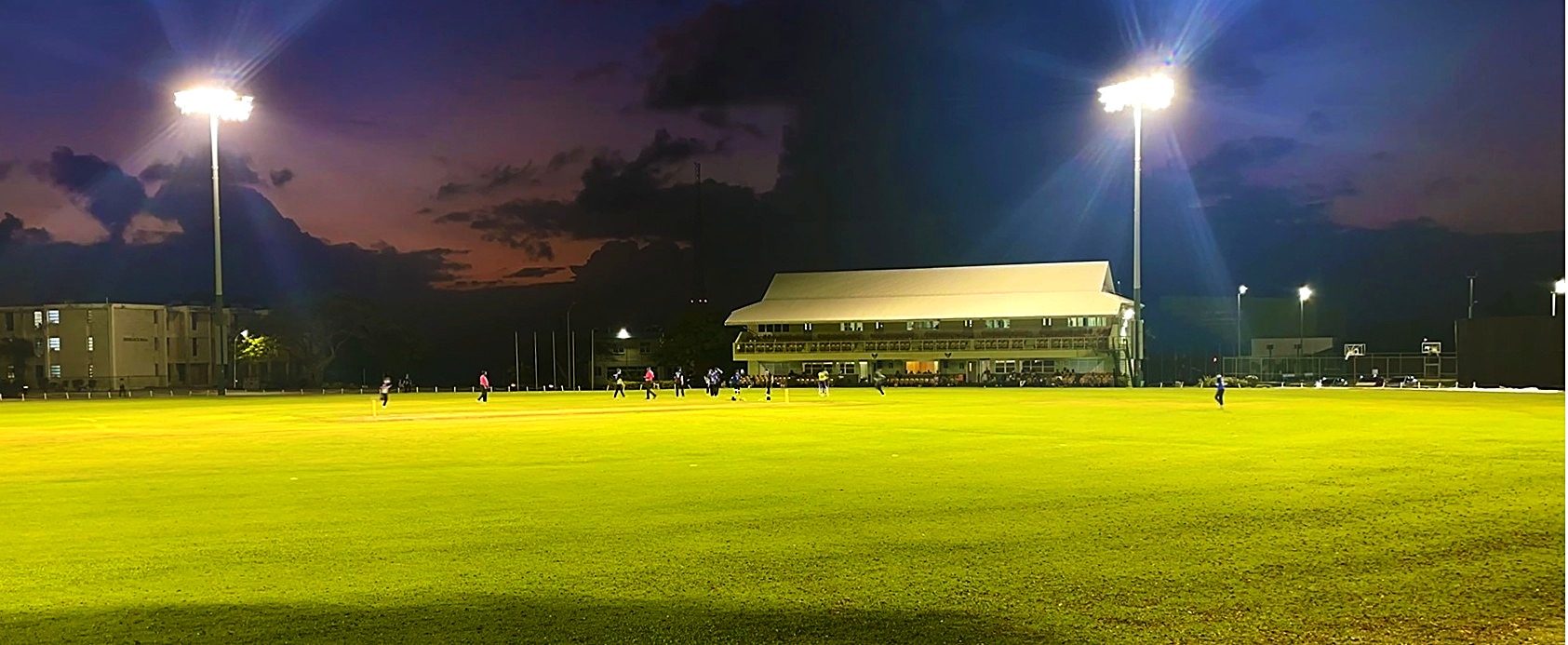 The ground under floodlights at night