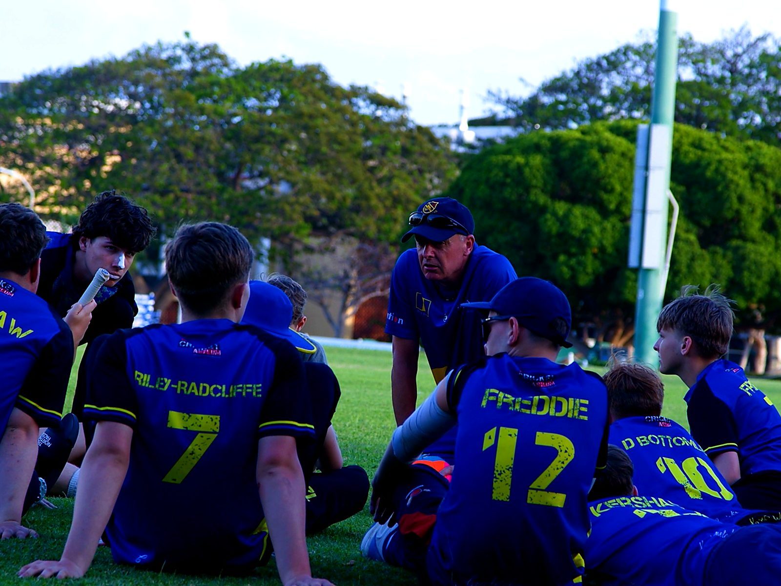 A team talk on the outfield