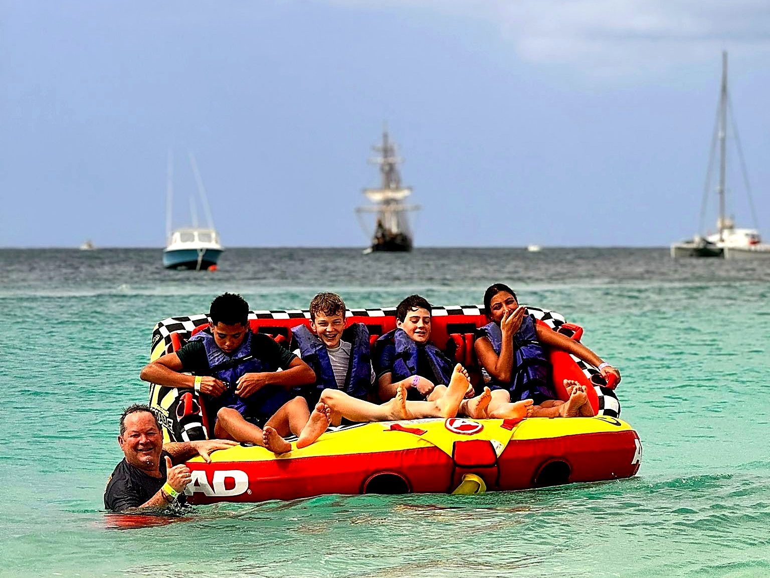 The squad on an inflatable at the Boatyard