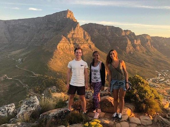 Walkers above Cape Town with Table Mountain behind